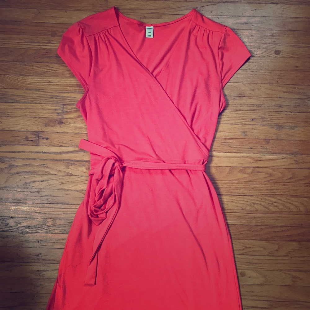 Salmon colored wrap dress.
